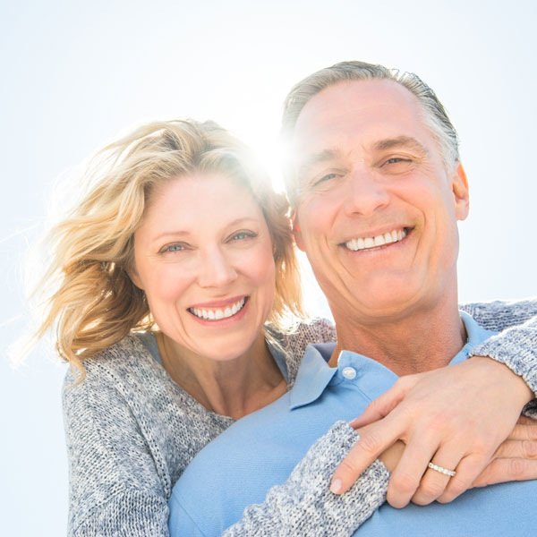smiling middle aged couple